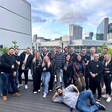 Team photo on roof